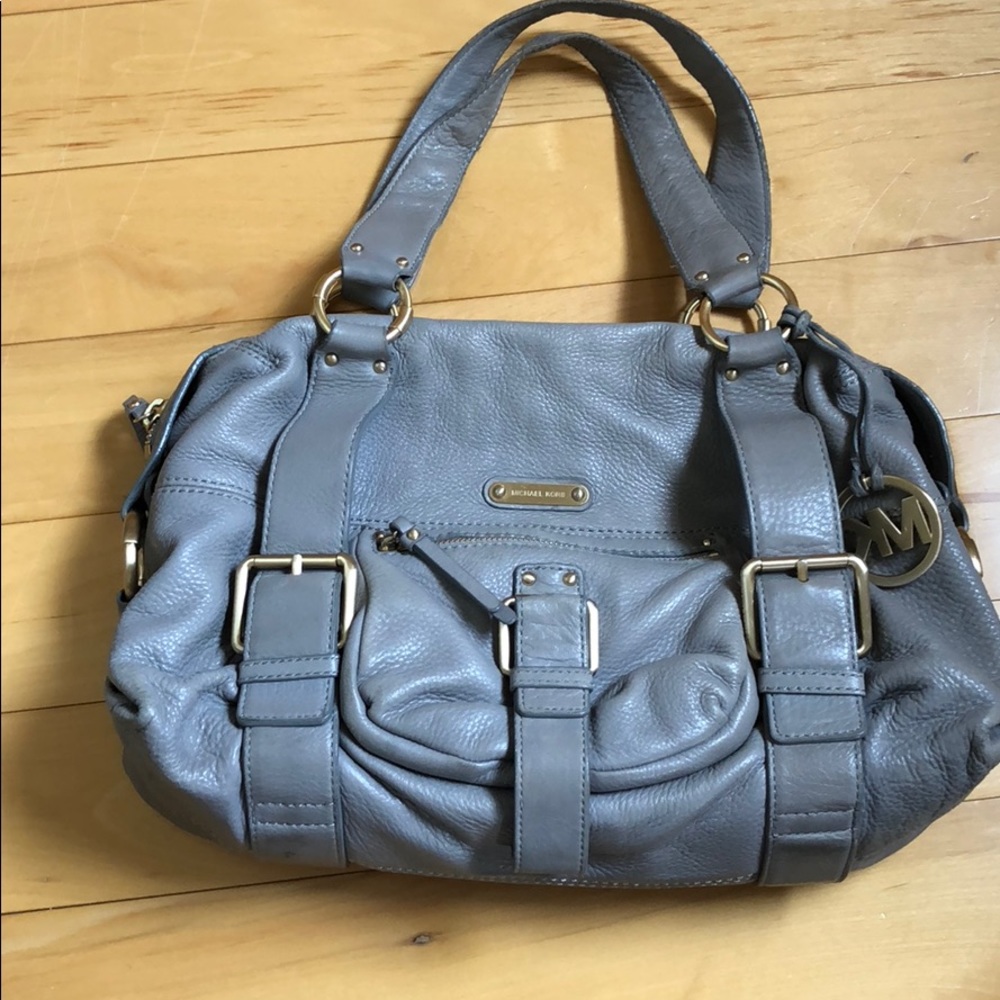 Michael Kors elephant gray bag with gold hardware